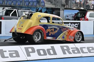 Prints of Ian Merryweather, Mary Poppins, Supercharged Outlaws, Supercharged Outlaws, With a style of racers more commonly seen in the US of A, this is a group of widely differing styles Dragstalgia Santa Pod June 2025 Prints: CZ3_0095 Ian Merryweather, Mary Poppins.jpg