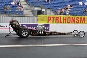 Prints of Brian Watson, slingshot dragster, O Black Betty, Supercharged Outlaws, With a style of racers more commonly seen in the US of A, this is a group of widely differing styles Dragstalgia Santa Pod June 2025 Prints: CZ3_0174 Brian Watson, slingshot dragster, O Black Betty.jpg