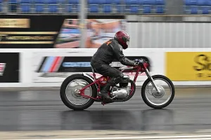 Prints of Tim Howell, BSA Lightning, Naomi, NSA Bike Shootout, From the classic day's of Santa Pod in the 1970's the NSA Bike shootout is a firm favourite for the spectators Dragstalgia Santa Pod June 2025 Prints: CZ3_0300 Tim Howell, BSA Lightning, Naomi.jpg