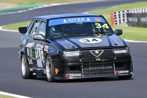 Prints of George Osborne, Alfa Romeo 75, Pre-85 Alfa Romeo and Italian Intermarque Classico, two 20 minute races, with cars split into six classes A-F, Class A - Saloon's/Sports unto 1600cc Festival Italia Brands Hatch August 2025 Prints: CZ3_6486 George Osborne, Alfa Romeo 75.jpg