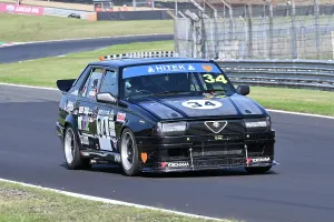 Prints of George Osborne, Alfa Romeo 75, Pre-85 Alfa Romeo and Italian Intermarque Classico, two 20 minute races, with cars split into six classes A-F, Class A - Saloon's/Sports unto 1600cc Festival Italia Brands Hatch August 2025 Prints: CZ3_6506 George Osborne, Alfa Romeo 75.jpg