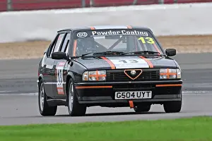Prints of Gary Holman, Alfa Romeo 33QV, HRDC Allstars, a fifteen minute dry qualifying session followed by a thirty minute race in pouring rain, a single driver event for pre-1966 Sports Motor Racing Legends, Silverstone, October 2025 Prints: CZ5_2763 Gary Holman, Alfa Romeo 33QV.jpg
