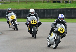 A Norton trio through the chicane. Goodwood Revival 2013 A Norton trio through the chicane. Goodwood Revival 2013